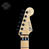 Front of headstock of Charvel Custom Shop San Dimas 2H FR Red Sparkle.