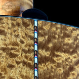 Detail on back of Collings CJ Old Growth Sitka Baked Bubble Maple.