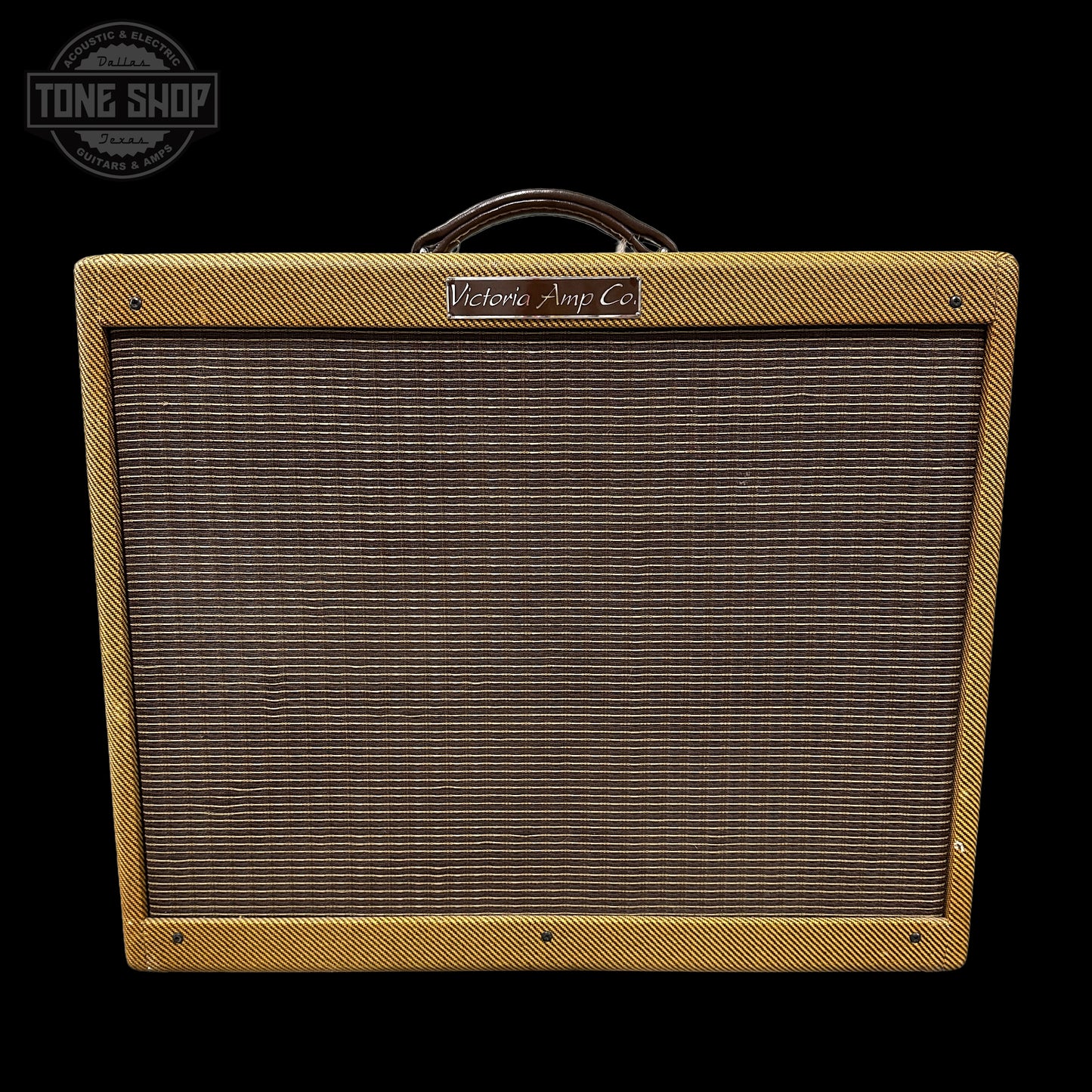 Vintage guitar amplifier with 'Victoria Amp Co' branding on a black background