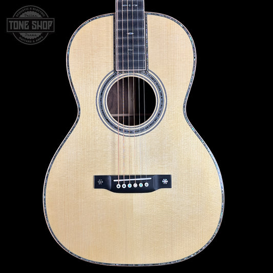 Front of Martin Custom Shop 00-12F 45 Style Adirondack/Wild Grain East Indian Rosewood.