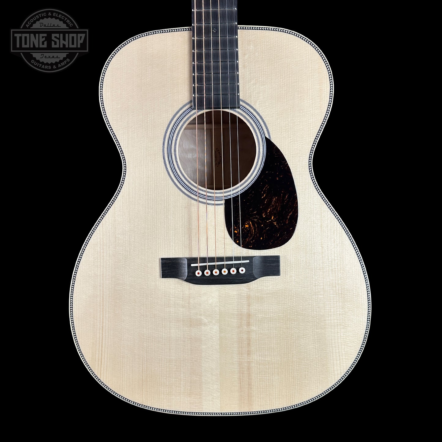 Front of Martin Custom Shop 000 14-Fret Quilted Maple.