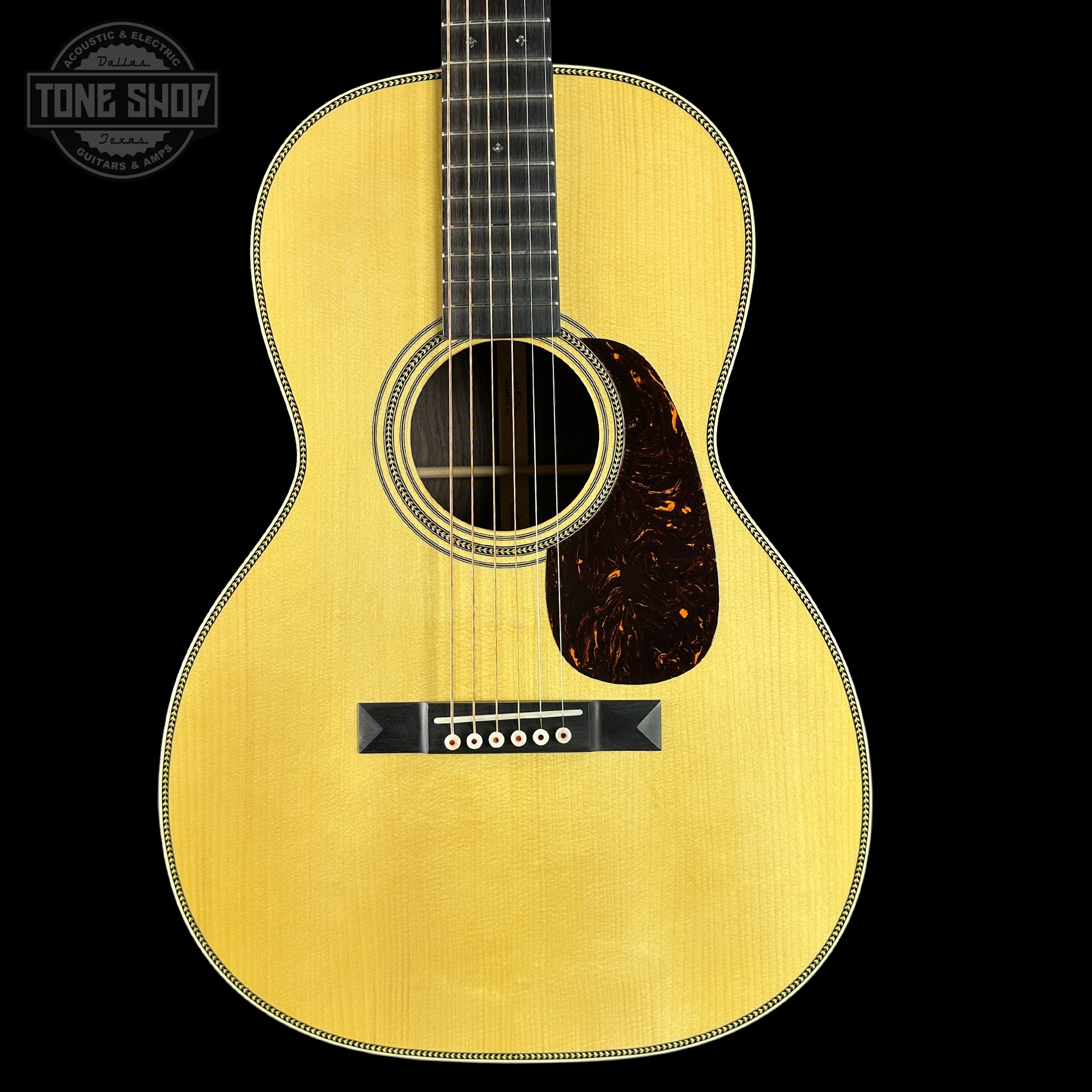 Front of Martin Custom Shop 00-12 Fret Wild Grain East Indian Rosewood.