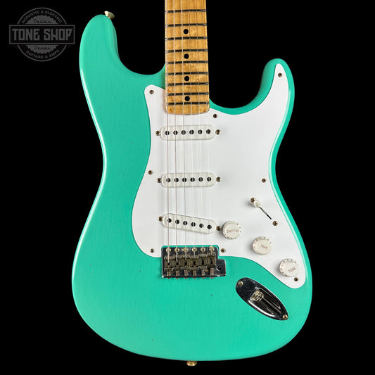 Front of Fender Custom Shop 70th Anniversary 1954 Stratocaster Journeyman Relic Seafoam Green.