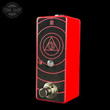 Red and black guitar effects pedal with a logo on a black background, featuring 'The Tone Shop' branding.