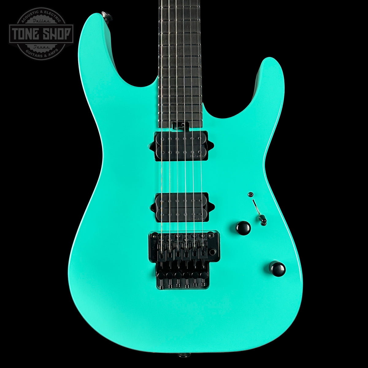 Front of Charvel Custom Shop DK24 HH FR Reverse Headstock Sea Foam Green.