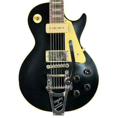Front of Custom Shop Dealer Select 1956 Les Paul Standard Bigsby Ebony Top Light Aged NH.