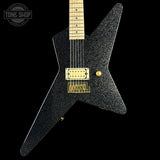 Black electric guitar with gold hardware on a black background, featuring 'Tone Shop' logo.