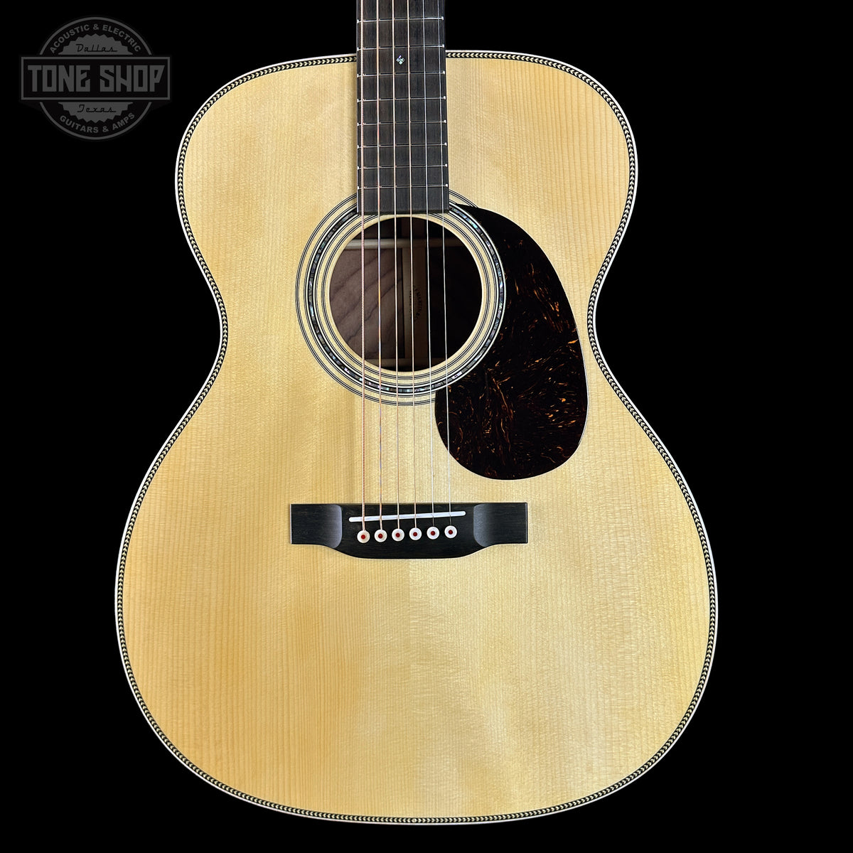 Front of Martin Custom Shop OM 14-Fret Wild Grain East Indian Rosewood.