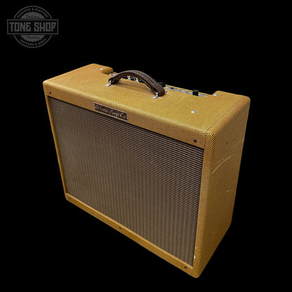 Guitar amplifier with a textured yellow front panel on a black background, featuring 'Tone Shop' logo.