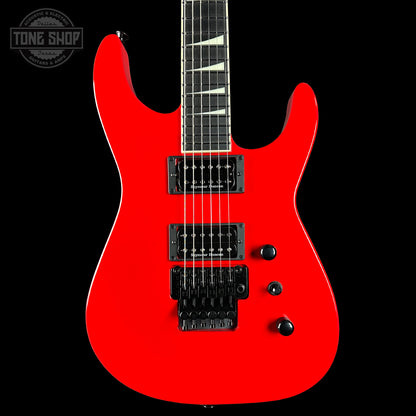 Red electric guitar on a black background with 'Tone Shop' logo.