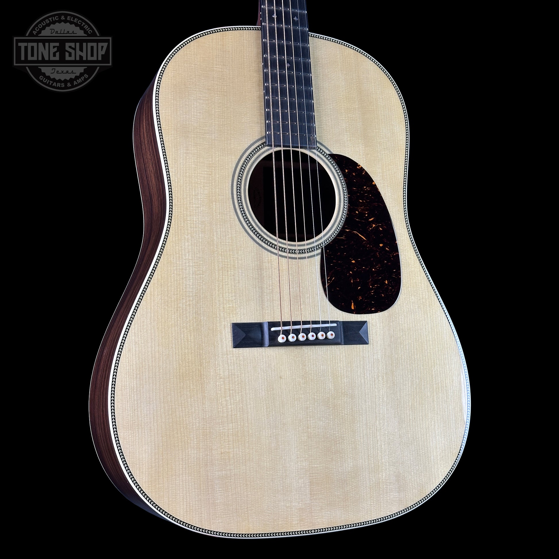 Front angle of Martin Custom Shop Dread 12-Fret Wild Grain East Indian Rosewood.