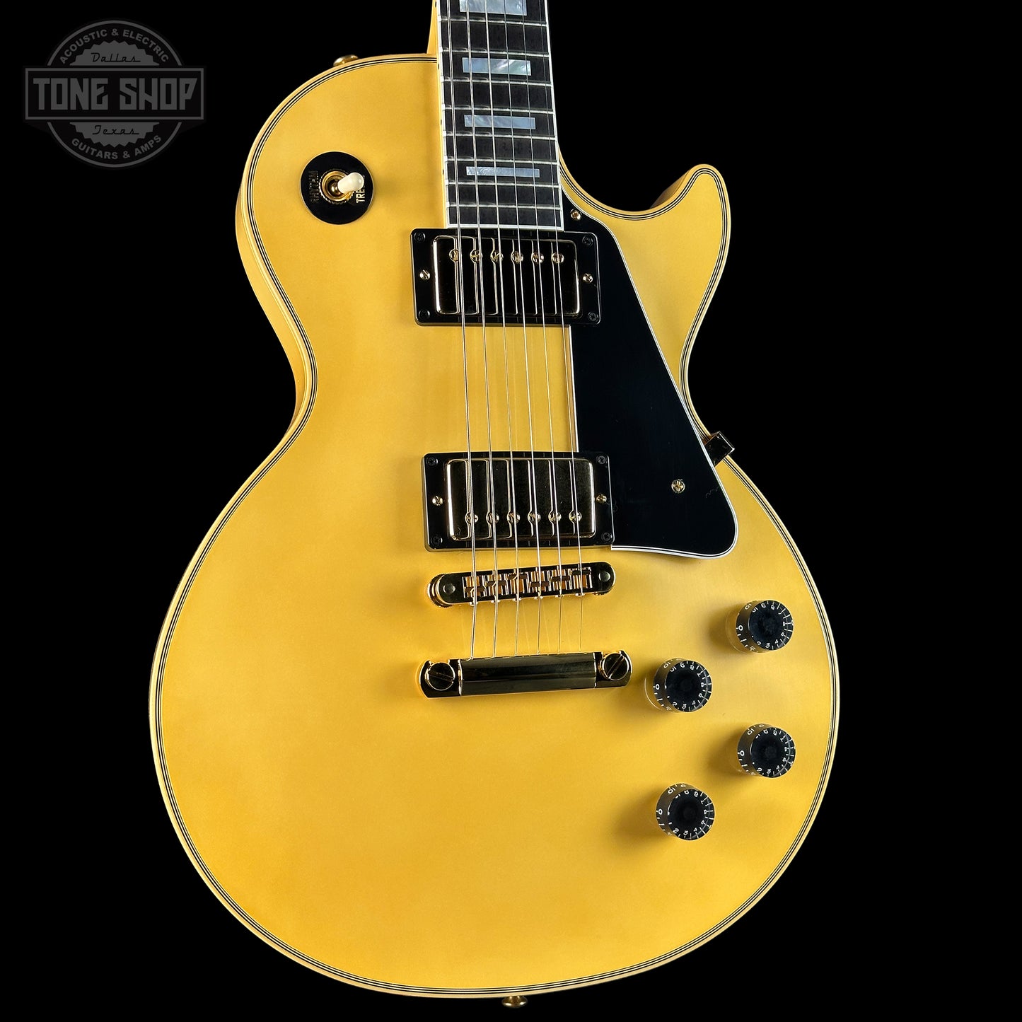 Front angle of Gibson Custom Les Paul Custom Chambered Heavy Antique White VOS.