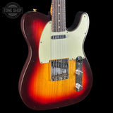 Electric guitar with a sunburst finish on a black background, featuring the Tone Shop logo.