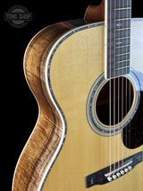 Front angle of Martin Custom Shop OM 41 Style Adirondack / Exceptional Broad Figure Koa.