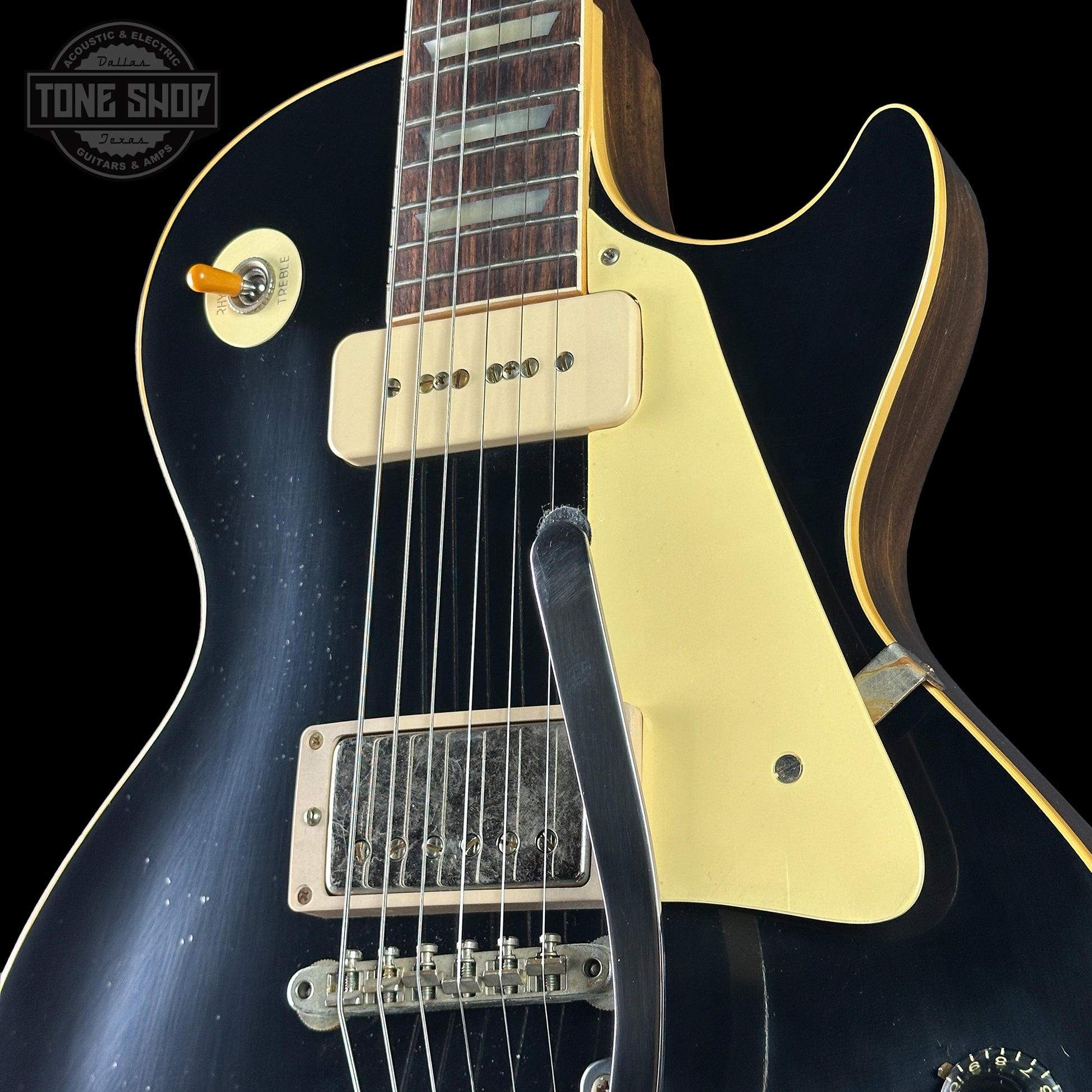 Front angle of Custom Shop Dealer Select 1956 Les Paul Standard Bigsby Ebony Top Light Aged NH.
