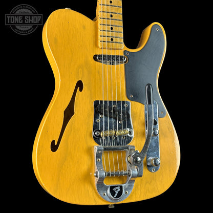 Front angle of Fender Custom Shop Postmodern Tele MN Journeyman Relic Aged Butterscotch Blonde.