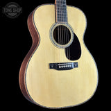 Front angle of Martin Custom Shop OM 42 Style Adirondack/Wild Grain East Indian Rosewood.