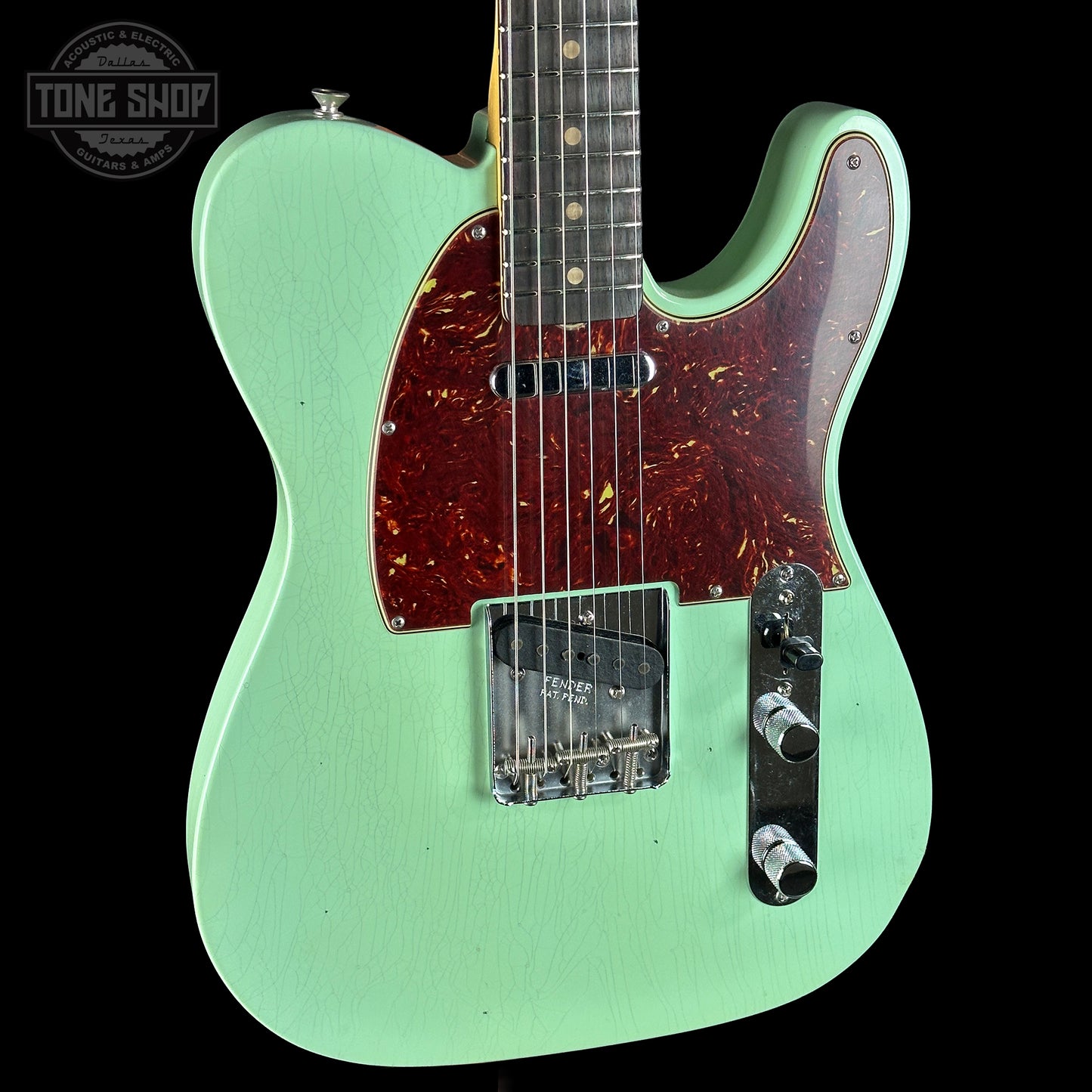Front angle of Fender Custom Shop 1963 Telecaster Journeyman Relic Aged Surf Green.