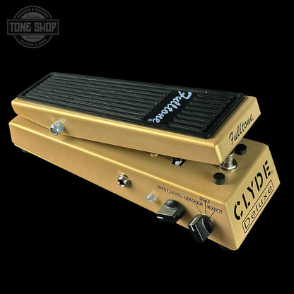 Gold guitar pedal with 'Fulltone' branding on a black background