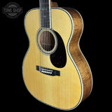 Front angle of Martin Custom Shop OM 45 Style Adirondack/Exceptional Broad Figure Koa.