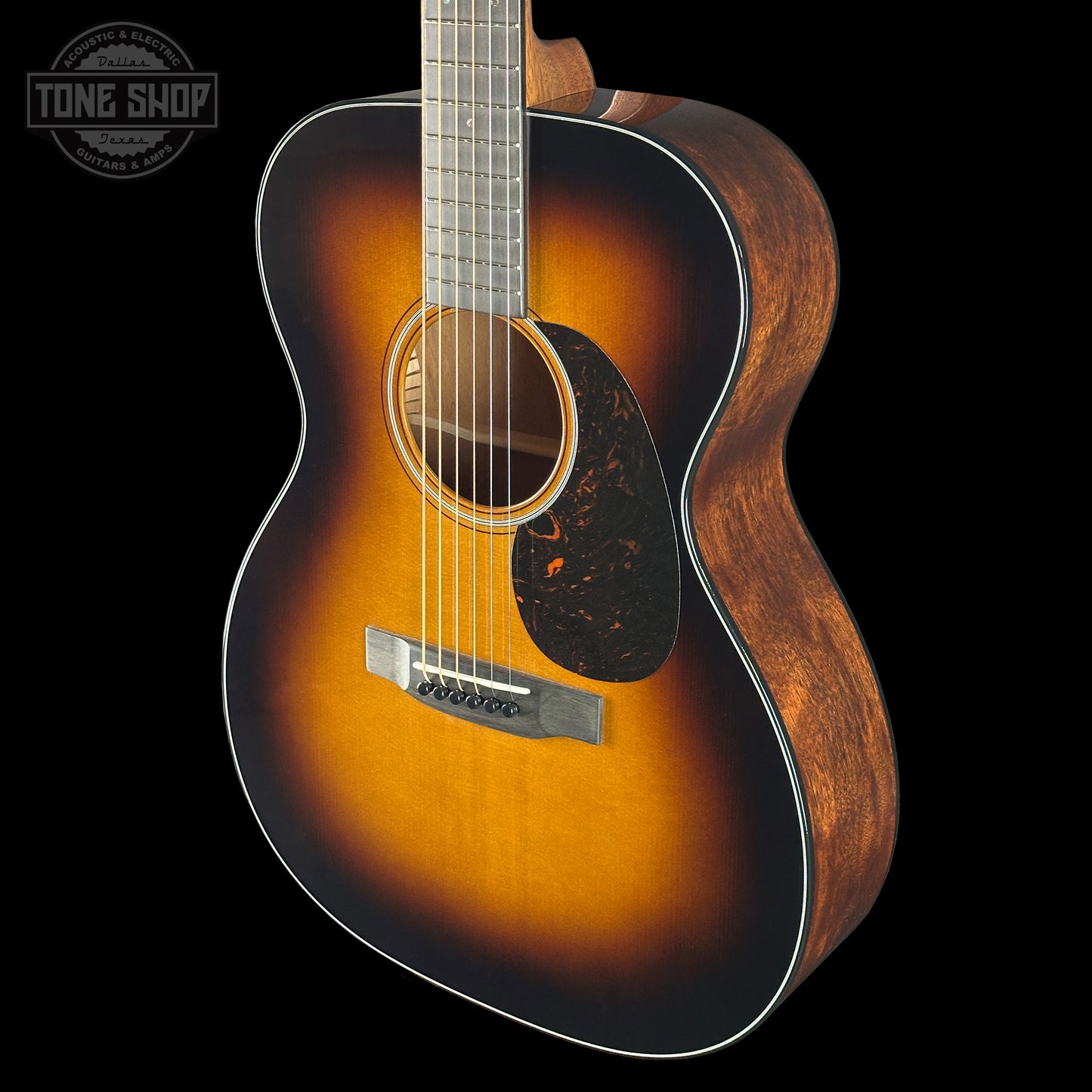 Front angle of Martin Custom Shop 000 14-Fret Jaguar Claw Mahogany Sunburst.