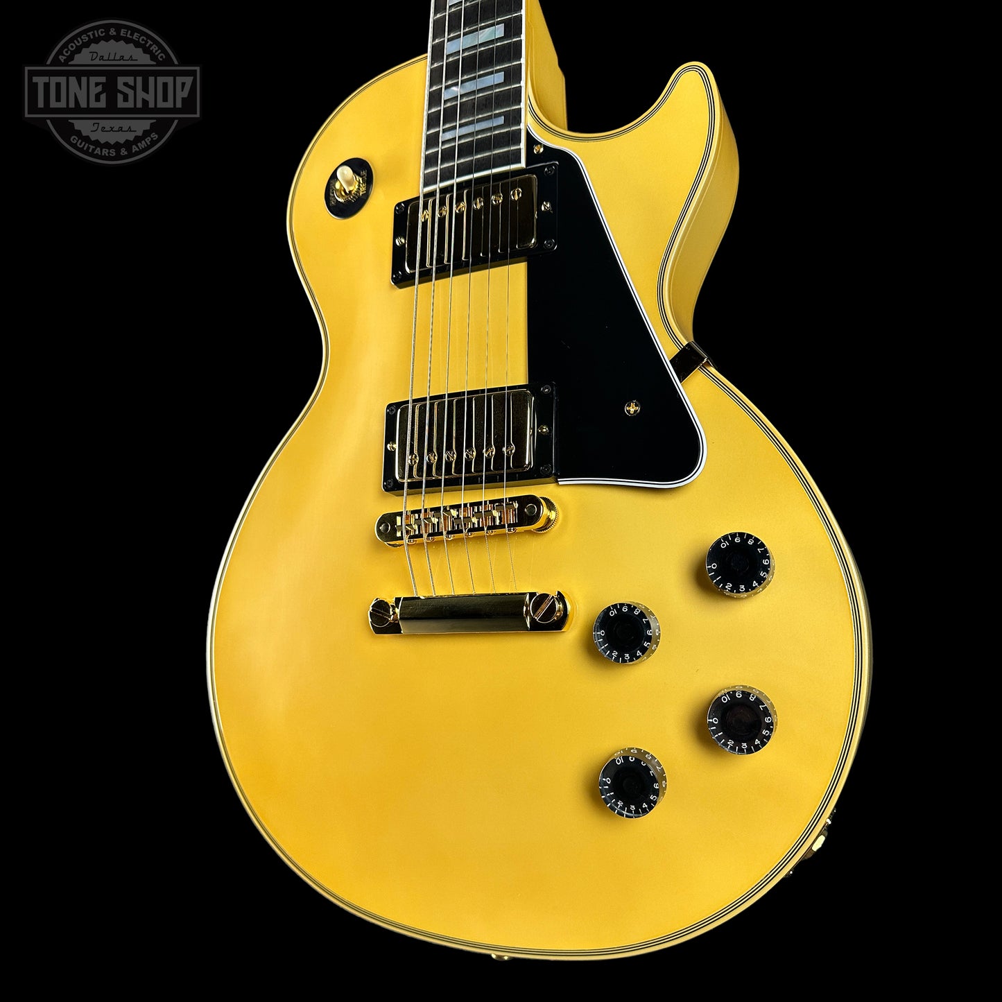 Front angle of Gibson Custom Les Paul Custom Chambered Heavy Antique White VOS.