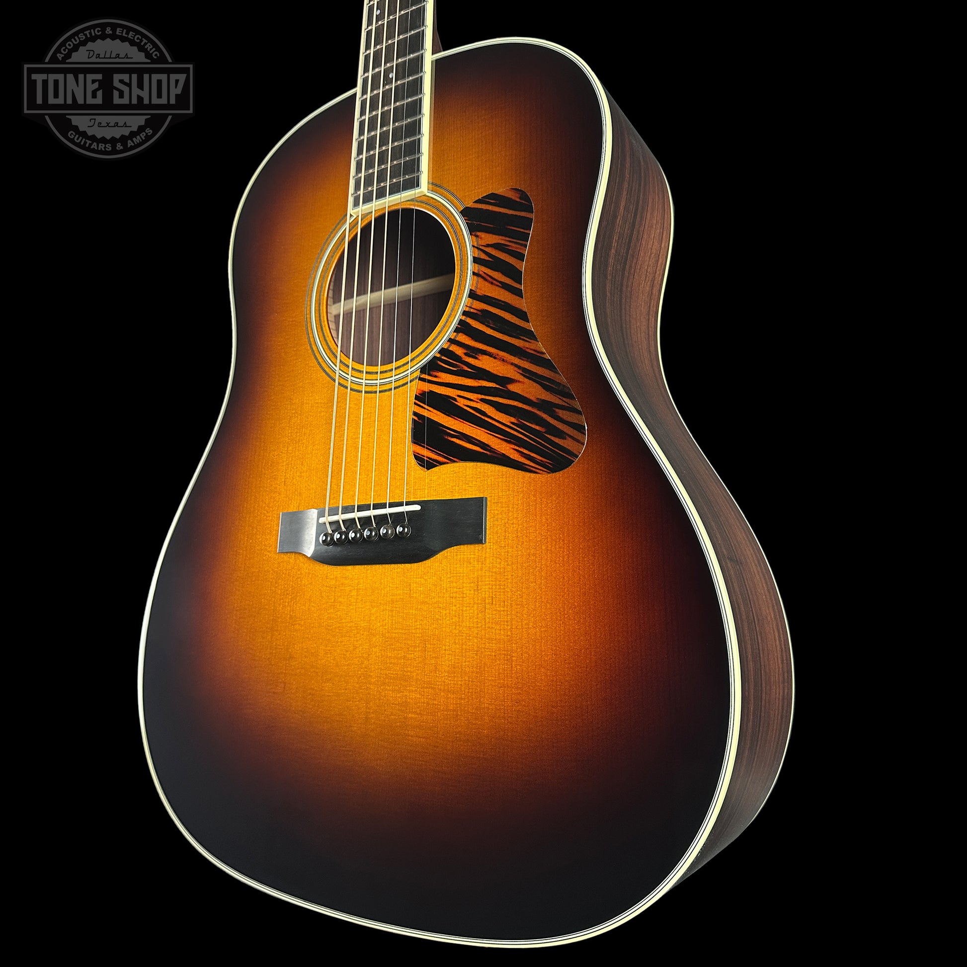 Front angle of Collings CJ Adirondack Sunburst Tigerstripe Pickguard.