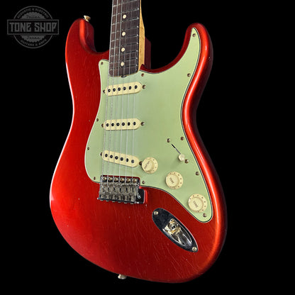 Front angle of Fender Custom Shop 1963 Stratocaster Journeyman Relic AAA Maple Neck Melon Candy.