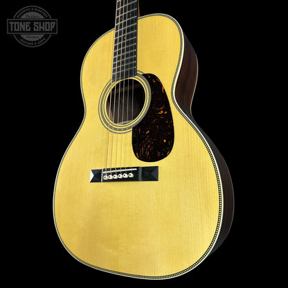 Front angle of Martin Custom Shop 00-12 Fret Wild Grain East Indian Rosewood.