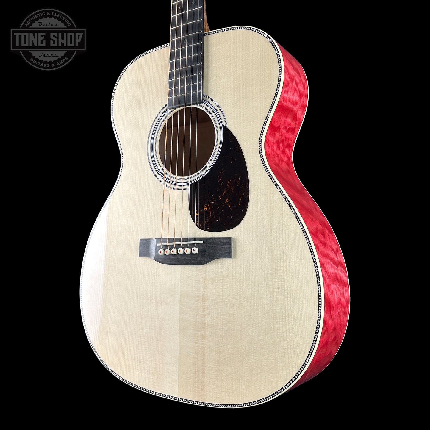 Front angle of Martin Custom Shop 000 14-Fret Quilted Maple.