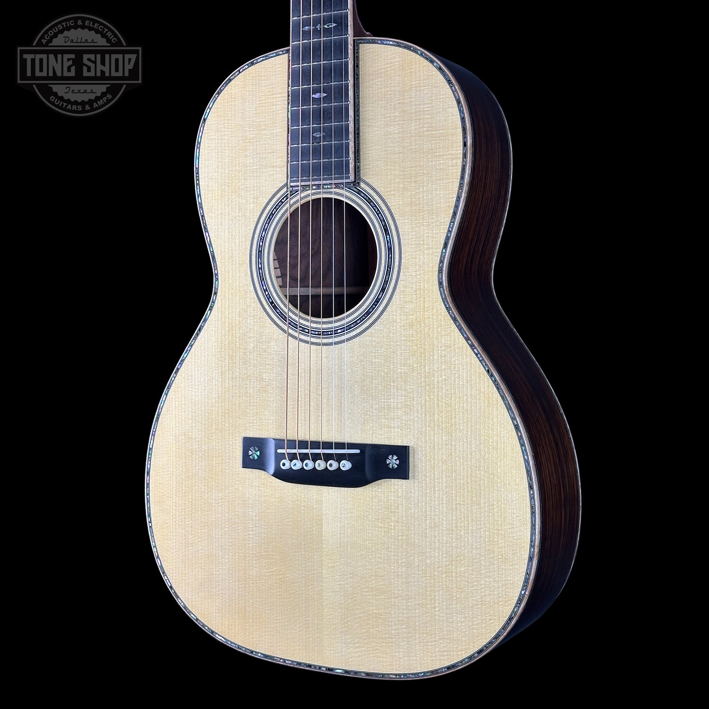 Front angle of Martin Custom Shop 00-12F 45 Style Adirondack/Wild Grain East Indian Rosewood.