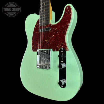 Front angle of Fender Custom Shop 1963 Telecaster Journeyman Relic Aged Surf Green.