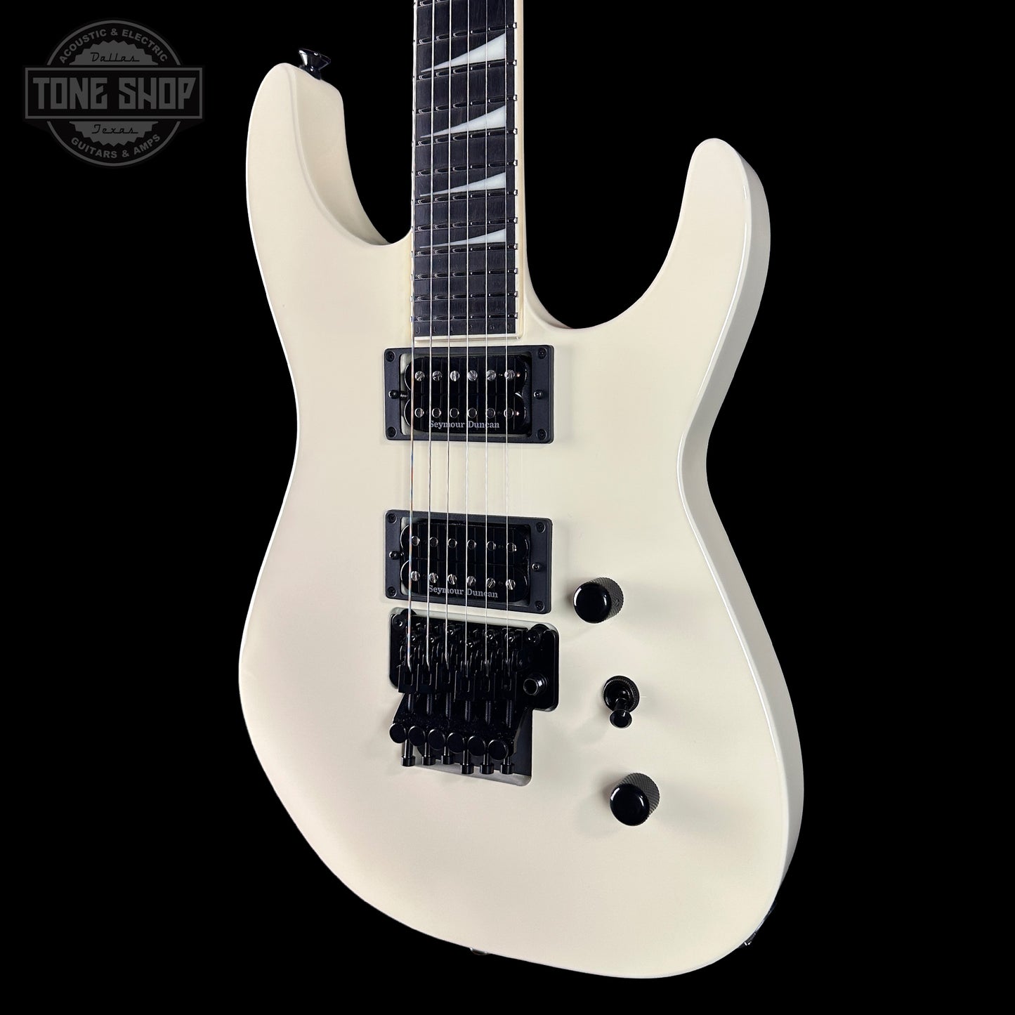 Front angle of Jackson Custom Shop TSG Illuminati SL2H FR Vanilla Shake.