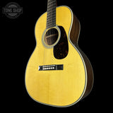 Front angle of Martin Custom Shop 00-12F 28 Style Italian Alpine Spruce/ Wild Grain East Indian Rosewood.