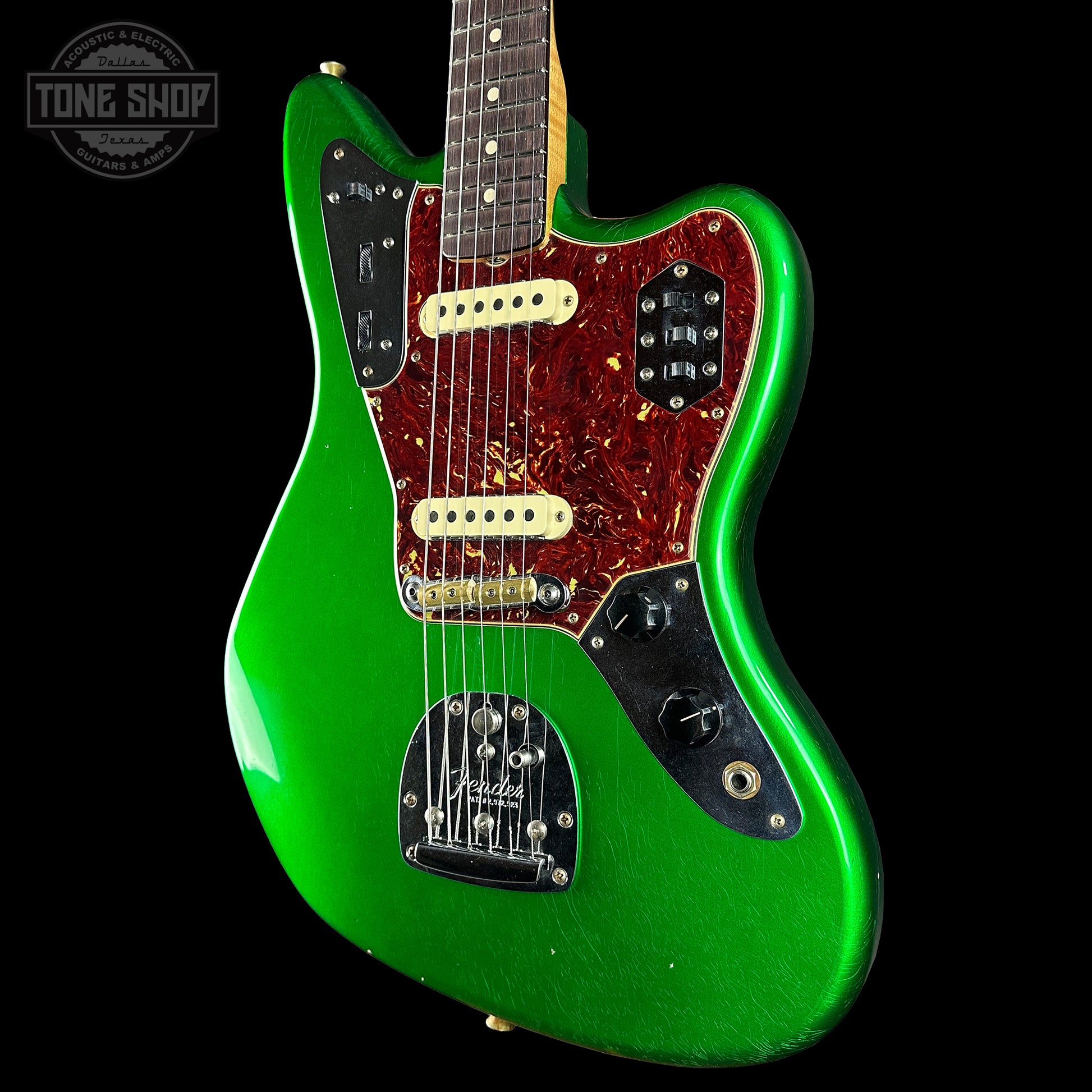 Front angle of Fender Custom Shop 1962 Jaguar Journeyman Relic PHC Candy Green.