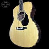 Front angle of Martin Custom Shop OM 42 Style Adirondack/Wild Grain East Indian Rosewood.