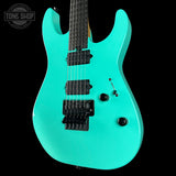 Front angle of Charvel Custom Shop DK24 HH FR Reverse Headstock Sea Foam Green.