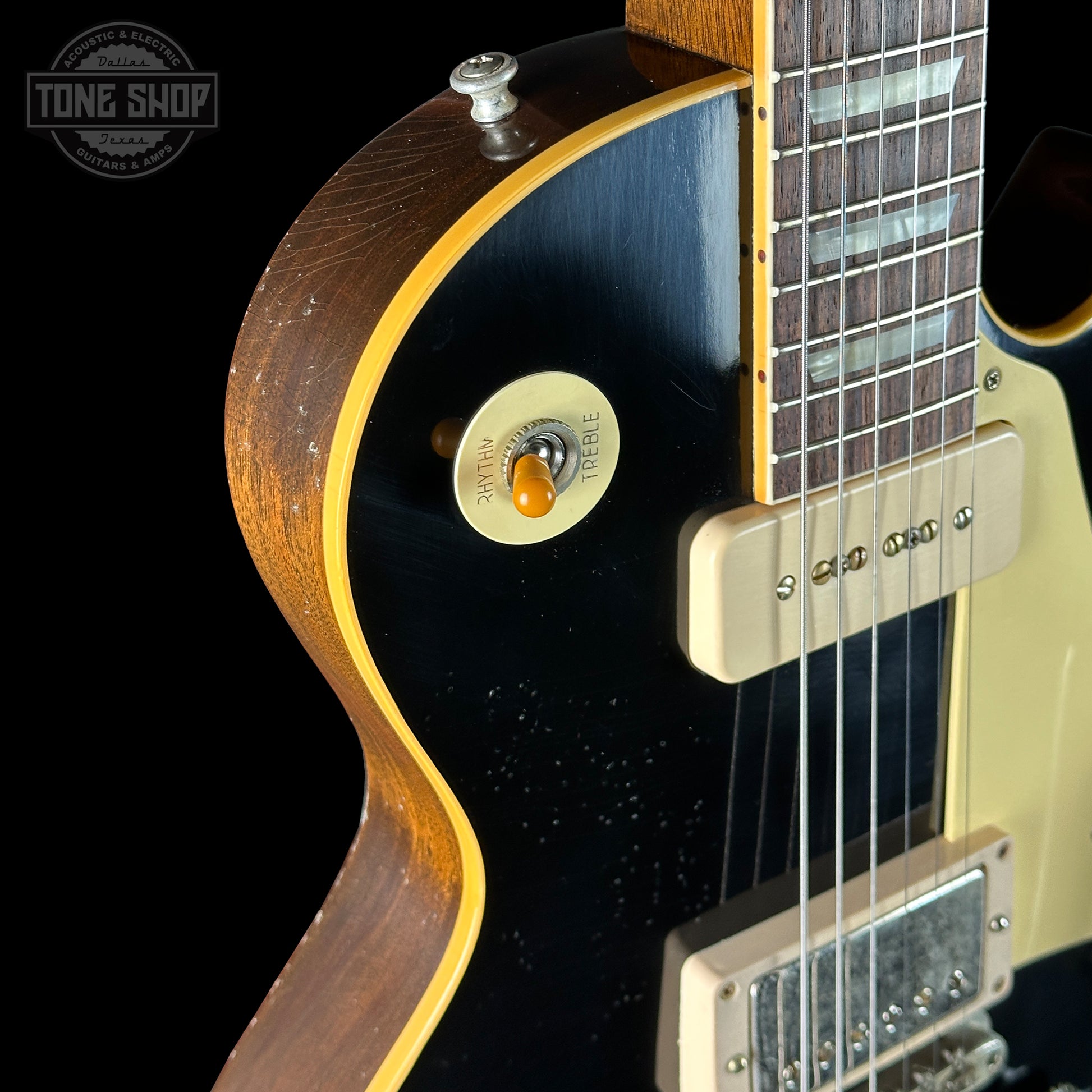Front angle of Custom Shop Dealer Select 1956 Les Paul Standard Bigsby Ebony Top Light Aged NH.