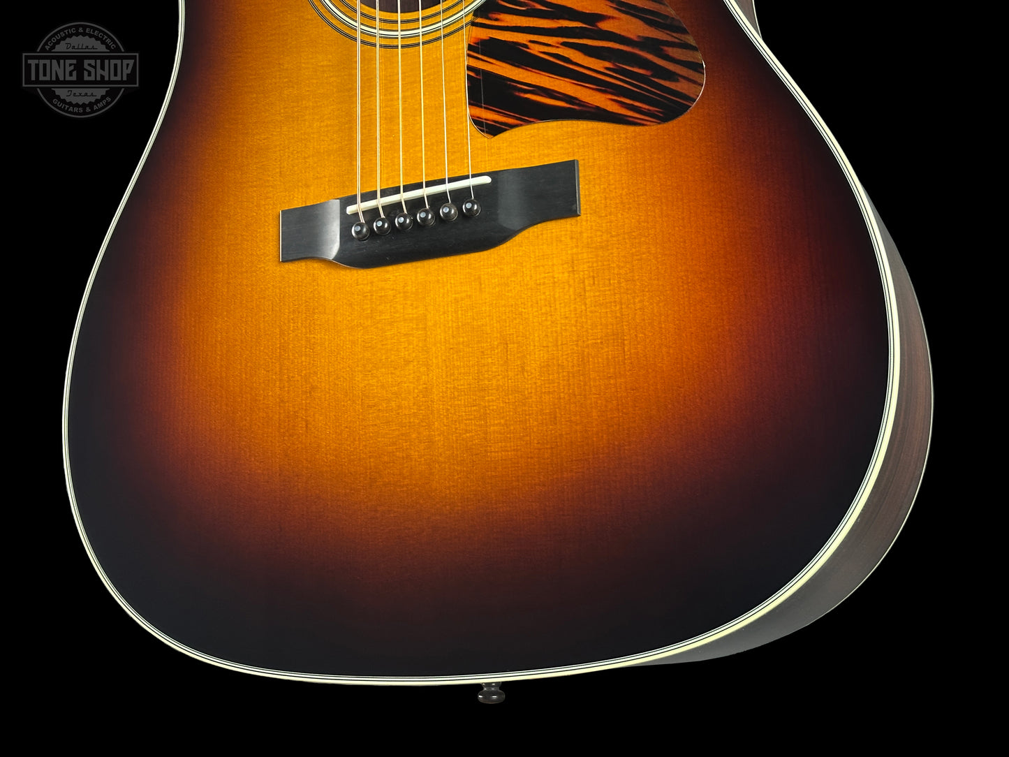 Front angle of Collings CJ Adirondack Sunburst Tigerstripe Pickguard.