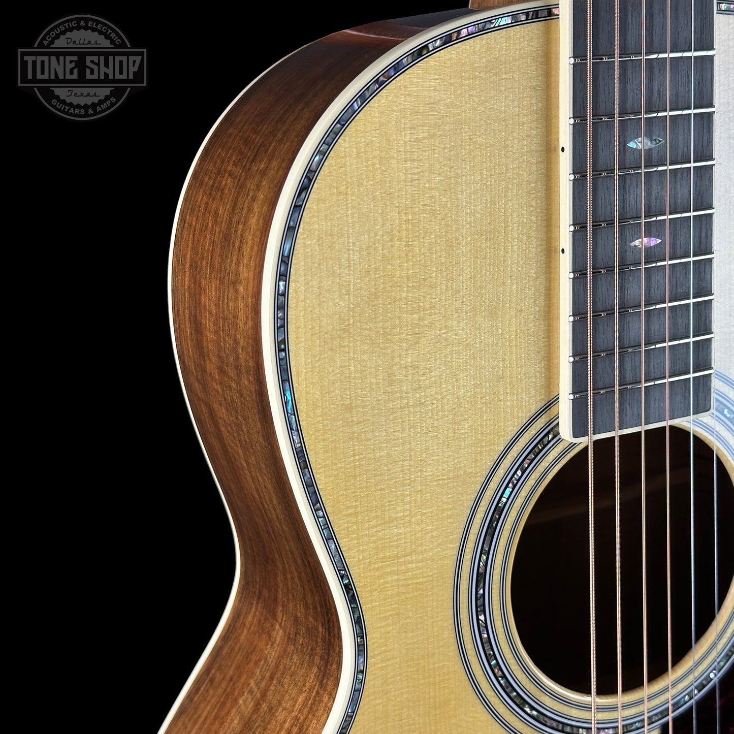 Front angle of Martin Custom Shop 00-12F 41 Style Adirondack/Exceptional Broad Figure Koa.