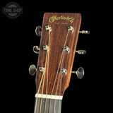 Guitar headstock with 'Martin' logo on a black background