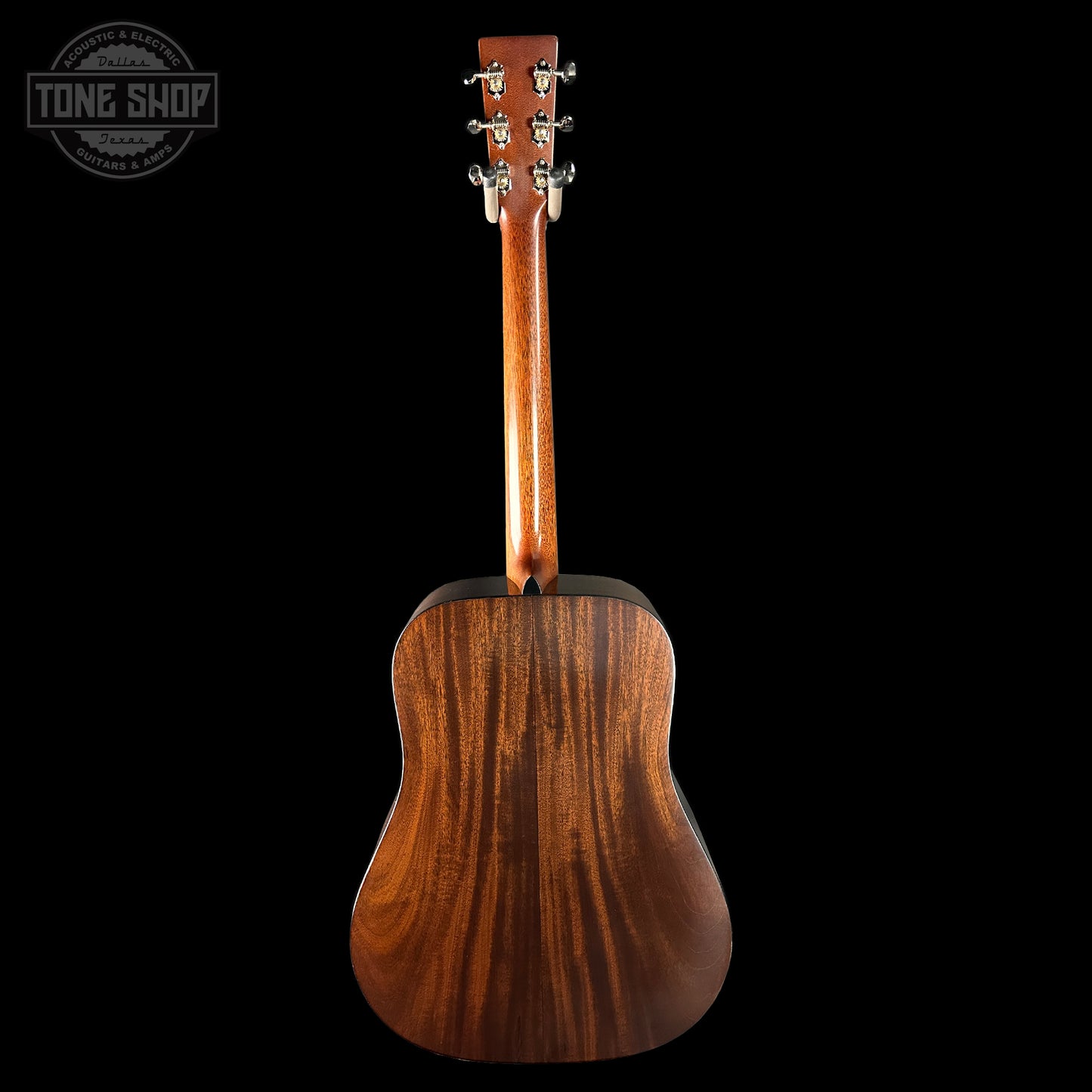 Wooden acoustic guitar on a black background with 'Tone Shop' logo.
