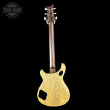 Back view of a guitar with a visible brand logo in the corner.