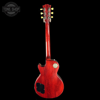 Red electric guitar on a black background with 'Tone Shop' logo.