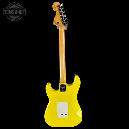 Yellow electric guitar on a black background with 'Tone Shop' logo.