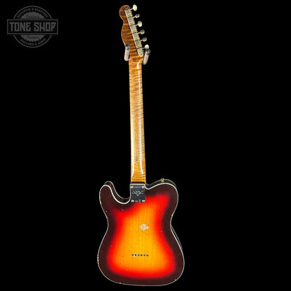 Electric guitar with a sunburst finish on a black background, featuring the Tone Shop logo.