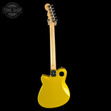 Yellow electric guitar with a black background