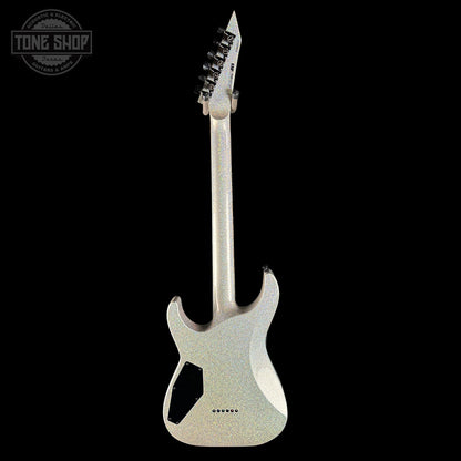 Silver electric guitar with unique design on a black background
