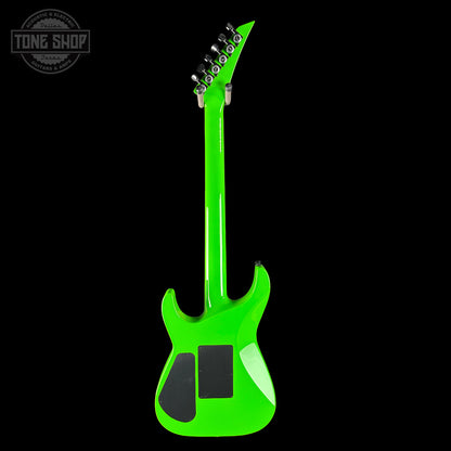 Green electric guitar on a black background with 'Tone Shop' logo.