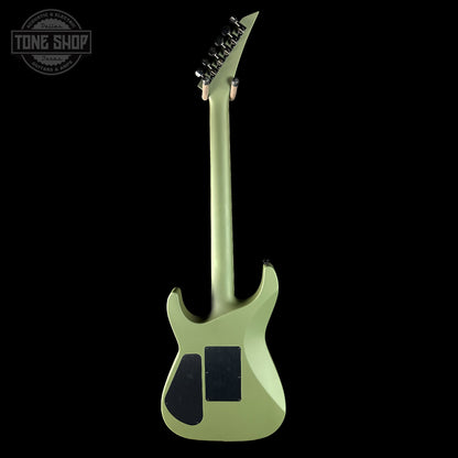 Green electric guitar on a black background with 'Tone Shop' logo.
